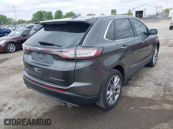 2015 Ford Edge Titanium z VIN 2FMTK3K81FBB88882, wystawiony jako IAAI lot #42184698 z przebiegiem 161 858 mil mil oraz . Historia ofert i sprzedaży dostępna na DreamBid. Obrazek 4.