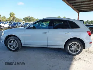 2015 Audi Q5 Premium Plus z VIN WA1LFAFP7FA059789, wystawiony jako IAAI lot #42574522 z przebiegiem 99 638 mil mil oraz . Historia ofert i sprzedaży dostępna na DreamBid. Obrazek 14.