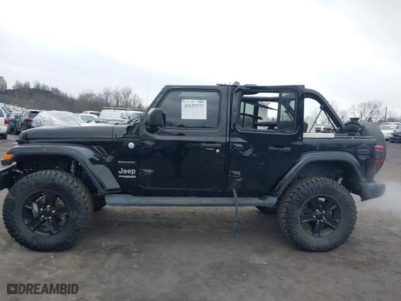 2018 Jeep Wrangler Unlimited Sahara with VIN 1C4HJXEG6JW289575, listed as a IAAI auction lot 41629737 with 74,654 mi miles. Bid and sale history available at carsss.com. Image 14.