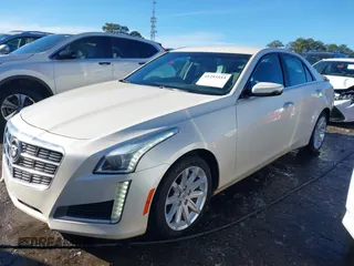 2014 Cadillac CTS Sedan RWD with VIN 1G6AP5SX3E0130274, listed as a IAAI auction lot 41293553 with 138,524 mi miles. Bid and sale history available at carsss.com. Image 17.