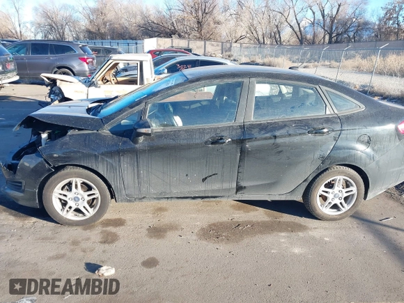 2017 Ford Fiesta SE z VIN 3FADP4BJ6HM125903, wystawiony jako IAAI lot #41376018 z przebiegiem 114 628 mil mil oraz . Historia ofert i sprzedaży dostępna na DreamBid. Obrazek 14.