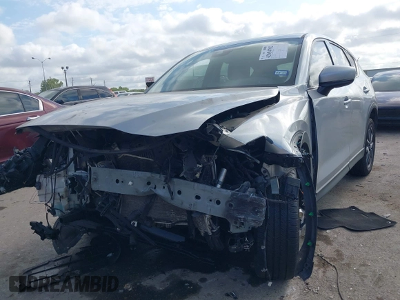 2018 Mazda CX-5 Grand Touring with VIN JM3KFADM6J0325626, listed as a IAAI auction lot 42054702 with 121,952 mi miles and . Bid and sale history available at DreamBid. Image 16.