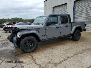 2021 Jeep Gladiator Sport S z VIN 1C6HJTAG1ML599287, wystawiony jako Copart lot #71597864 z przebiegiem 23 186 mil mil oraz Szkoda całkowita • Salvage title. Historia ofert i sprzedaży dostępna na DreamBid. Obrazek 1.