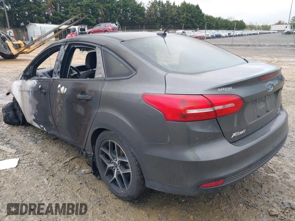 2018 Ford Focus SE with VIN 1FADP3FE8JL256720, listed as a IAAI auction lot 41972795 with 1 mi miles. Bid and sale history available at carsss.com. Image 3.
