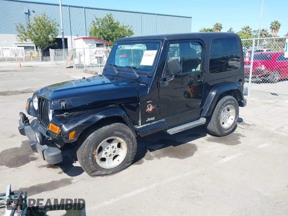 2001 Jeep Wrangler Sahara z VIN 1J4FA59S41P313113, wystawiony jako IAAI lot #42266173 z przebiegiem 125 792 mil mil oraz . Historia ofert i sprzedaży dostępna na DreamBid. Obrazek 2.