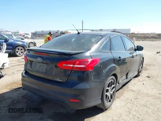 2015 Ford Focus SE with VIN 1FADP3F24FL313640, listed as a IAAI auction lot 41651845 with 146,390 mi miles. Bid and sale history available at carsss.com. Image 4.