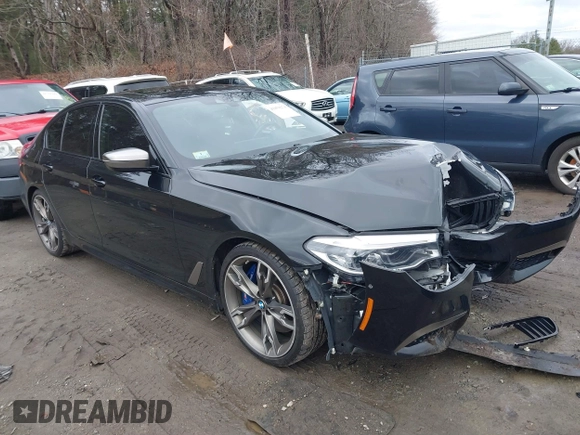 2020 BMW 5 Series M550i xDrive z VIN WBAJS7C09LCD45078, wystawiony jako IAAI lot #41850274 z przebiegiem 75 613 mil mil oraz . Historia ofert i sprzedaży dostępna na DreamBid. Obrazek 1.