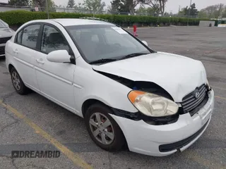2009 Hyundai Accent Auto GLS with VIN KMHCN46C79U333109, listed as a IAAI auction lot 42023502 with 230,123 mi miles. Bid and sale history available at carsss.com. Image 1.