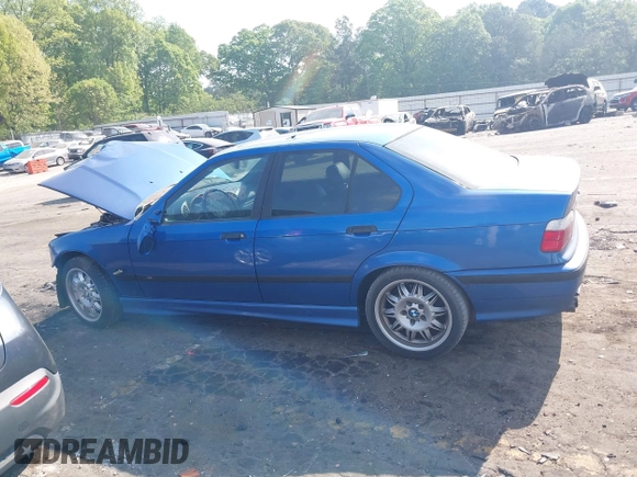 1998 BMW 3 Series z VIN WBSCD9324WEE08785, wystawiony jako IAAI lot #42065988 z przebiegiem 202 400 mil mil oraz . Historia ofert i sprzedaży dostępna na DreamBid. Obrazek 14.