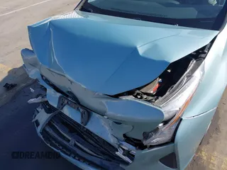 2016 Toyota Prius Four z VIN JTDKARFU6G3023120, wystawiony jako IAAI lot #41641228 z przebiegiem 117 334 mil mil oraz . Historia ofert i sprzedaży dostępna na DreamBid. Obrazek 6.
