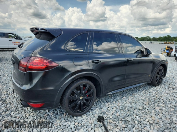 2013 Porsche Cayenne GTS с VIN WP1AD2A25DLA75526, выставлен на аукционе Copart как лот 60520865 с пробегом Не указан миль и Списание • Salvage title. История ставок и продаж доступна на DreamBid. Изображение 3.