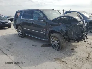 2015 GMC Yukon Denali with VIN 1GKS1CKJ2FR699959, listed as a Copart auction lot 42035195 with 0 mi miles and Salvage Title. Bid and sale history available at carsss.com. Image 4.