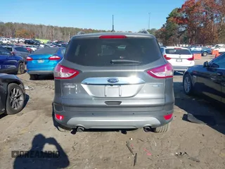 2014 Ford Escape Titanium with VIN 1FMCU9J94EUC50534, listed as a IAAI auction lot 41040341 with 115,502 mi miles. Bid and sale history available at carsss.com. Image 15.