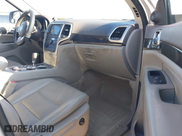 2011 Jeep Grand Cherokee Laredo z VIN 1J4RR4GG2BC511289, wystawiony jako IAAI lot #41240075 z przebiegiem 88 140 mil mil oraz . Historia ofert i sprzedaży dostępna na DreamBid. Obrazek 5.