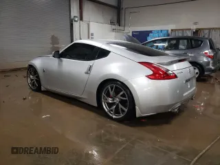 2014 Nissan 370Z Nismo with VIN JN1AZ4EH2EM636132, listed as a Copart auction lot 87218744 with 39,254 mi miles and Salvage Title. Bid and sale history available at DreamBid. Image 2.