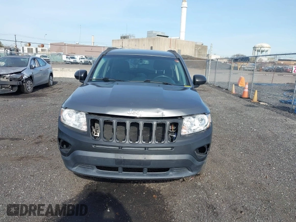 2013 Jeep Compass Latitude with VIN 1C4NJDEB7DD261645, listed as a IAAI auction lot 41948272 with 86,008 mi miles. Bid and sale history available at carsss.com. Image 6.