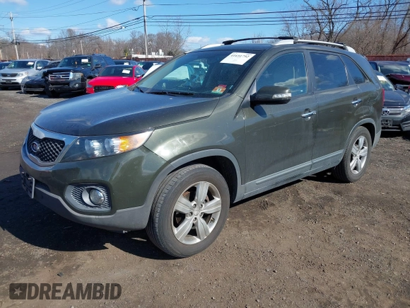 2012 Kia Sorento EX with VIN 5XYKU3A61CG269558, listed as a IAAI auction lot 41651792 with 171,754 mi miles. Bid and sale history available at carsss.com. Image 2.