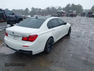 2015 BMW 7 Series 750Li xDrive with VIN WBAYF8C5XFD655174, listed as a IAAI auction lot 41480525 with 79,238 mi miles and . Bid and sale history available at carsss.com. Image 4.