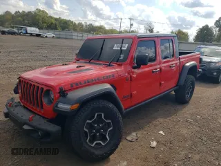 2022 Jeep Gladiator Rubicon с VIN 1C6JJTBGXNL111178, выставлен на аукционе Copart как лот 74686344 с пробегом 30 587 миль миль и Списание • Salvage title. История ставок и продаж доступна на DreamBid. Изображение 1.