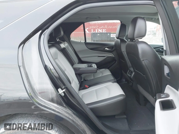2021 Chevrolet Equinox Premier z VIN 2GNAXXEV4M6118442, wystawiony jako IAAI lot #41392148 z przebiegiem 92 170 mil mil oraz . Historia ofert i sprzedaży dostępna na DreamBid. Obrazek 8.