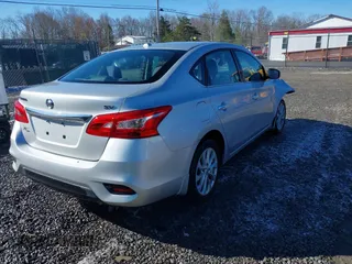 2018 Nissan Sentra S with VIN 3N1AB7AP7JY348567, listed as a IAAI auction lot 41834713 with 37,190 mi miles and . Bid and sale history available at DreamBid. Image 4.