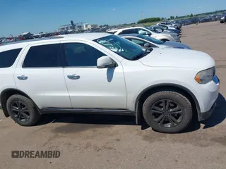 2013 Dodge Durango Crew with VIN 1C4RDJDG8DC664544, listed as a IAAI auction lot 42608957 with 202,564 mi miles and . Bid and sale history available at DreamBid. Image 13.
