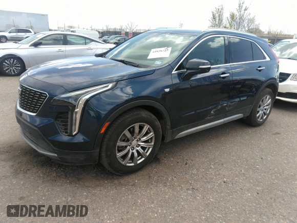 2021 Cadillac XT4 FWD Premium Luxury with VIN 1GYFZCR48MF004009, listed as a IAAI auction lot 41956723 with 82,483 mi miles. Bid and sale history available at carsss.com. Image 17.