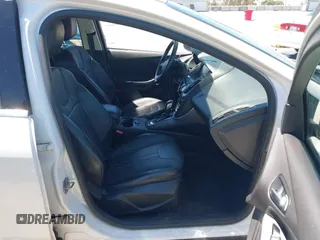 2014 Ford Focus Titanium with VIN 1FADP3N27EL330366, listed as a IAAI auction lot 42719377 with 97,009 mi miles and . Bid and sale history available at DreamBid. Image 5.