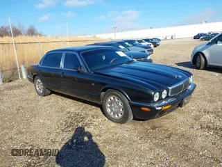 2000 Jaguar XJ with VIN SAJDA23C5YLF19267, listed as a IAAI auction lot 40899052 with 92,553 mi miles and . Bid and sale history available at DreamBid. Image 1.