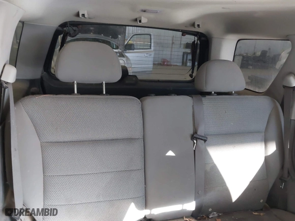 2005 Ford Escape XLT with VIN 1FMYU93165KA74210, listed as a IAAI auction lot 41388896 with 209,807 mi miles. Bid and sale history available at carsss.com. Image 8.