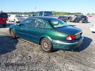 2006 Jaguar X-Type with VIN SAJWA51A46WE99813, listed as a IAAI auction lot 42011197 with 215,839 mi miles and . Bid and sale history available at DreamBid. Image 3.