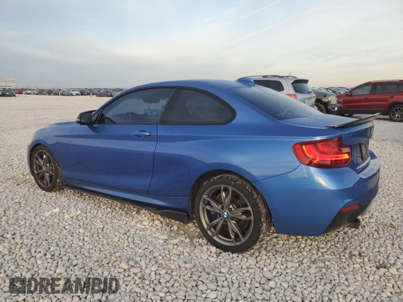 2015 BMW 2 Series M235i with VIN WBA1J7C59FV359017, listed as a Copart auction lot 82226554 with 87,881 mi miles and Salvage Title. Bid and sale history available at carsss.com. Image 2.