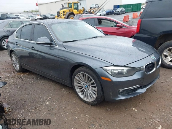 2012 BMW 3 Series 328i with VIN WBA3A5C50CF342321, listed as a IAAI auction lot 41914770 with 185,315 mi miles. Bid and sale history available at carsss.com. Image 1.
