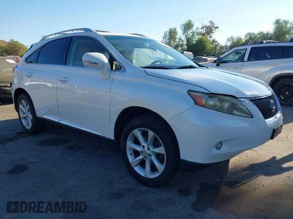 2011 Lexus RX 350 with VIN JTJZK1BAXB2005451, listed as a IAAI auction lot 41218592 with 185,801 mi miles. Bid and sale history available at carsss.com. Image 1.