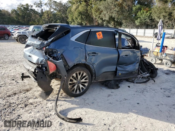 2020 Ford Escape Titanium Hybrid z VIN 1FMCU9DZ4LUC29367, wystawiony jako Copart lot #84709314 z przebiegiem Nie podano mil oraz Nie do naprawy • Non repairable. Historia ofert i sprzedaży dostępna na DreamBid. Obrazek 3.
