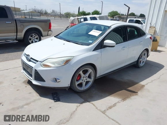 2012 Ford Focus SE with VIN 1FAHP3F25CL381667, listed as a IAAI auction lot 42025411 with 174,372 mi miles. Bid and sale history available at carsss.com. Image 2.