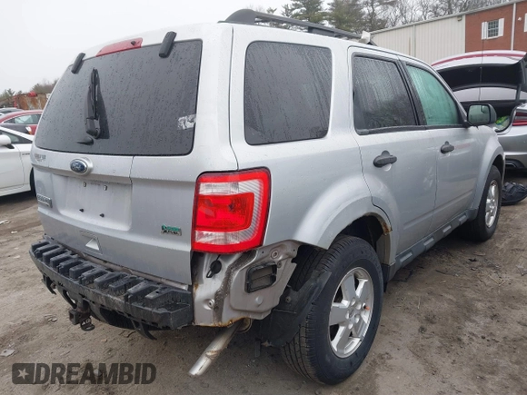 2011 Ford Escape XLT z VIN 1FMCU9DG1BKB17330, wystawiony jako IAAI lot #41822516 z przebiegiem 154 243 mil mil oraz . Historia ofert i sprzedaży dostępna na DreamBid. Obrazek 4.
