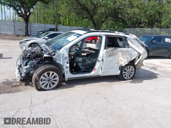 2022 Toyota Corolla Cross LE with VIN 7MUBAAAG9NV012455, listed as a IAAI auction lot 42671891 with Not provided miles and . Bid and sale history available at DreamBid. Image 14.