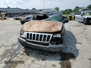 1999 Jeep Grand Cherokee Laredo с VIN 1J4GW58S1XC789715, выставлен на аукционе Copart как лот 60541335 с пробегом 206 569 миль миль и Чистый • Clean title. История ставок и продаж доступна на DreamBid. Изображение 14.
