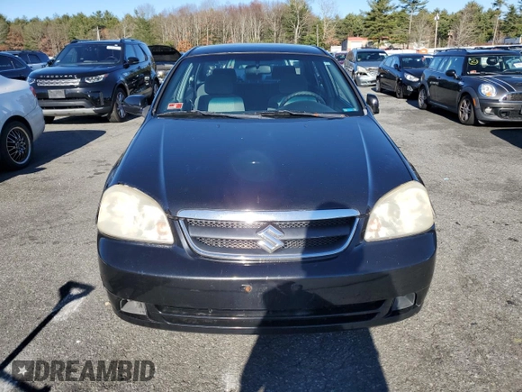 2006 Suzuki Forenza z VIN KL5JD56ZX6K278029, wystawiony jako Copart lot #82026904 z przebiegiem 117 700 mil mil oraz Szkoda całkowita • Salvage title. Historia ofert i sprzedaży dostępna na DreamBid. Obrazek 5.