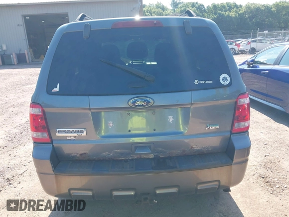 2012 Ford Escape XLT z VIN 1FMCU9DG7CKB28270, wystawiony jako IAAI lot #42607520 z przebiegiem 129 758 mil mil oraz . Historia ofert i sprzedaży dostępna na DreamBid. Obrazek 16.