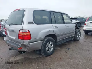 2002 Toyota Land Cruiser with VIN JTEHT05J322029734, listed as a IAAI auction lot 41953160 with 327,101 mi miles. Bid and sale history available at carsss.com. Image 4.