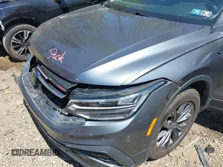 2022 Volkswagen Tiguan SE with VIN 3VV2B7AXXNM019538, listed as a IAAI auction lot 42109211 with 30,576 mi miles and . Bid and sale history available at DreamBid. Image 19.