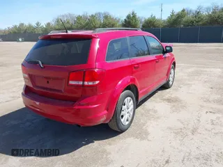 2016 Dodge Journey SE with VIN 3C4PDCAB2GT165839, listed as a IAAI auction lot 42045161 with 147,007 mi miles and . Bid and sale history available at DreamBid. Image 4.