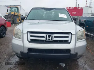 2007 Honda Pilot LX with VIN 2HKYF18157H530370, listed as a IAAI auction lot 41967033 with 214,590 mi miles and . Bid and sale history available at DreamBid. Image 12.