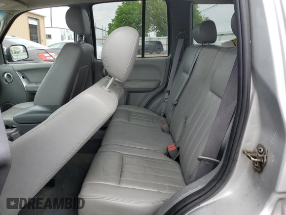 2005 Jeep Liberty Limited z VIN 1J4GL58K15W650799, wystawiony jako Copart lot #56036635 z przebiegiem 147 321 mil mil oraz Szkoda całkowita • Salvage title. Historia ofert i sprzedaży dostępna na DreamBid. Obrazek 11.