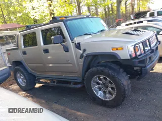 2005 Hummer H2 SUT with VIN 5GRGN22UX5H106653, listed as a IAAI auction lot 42015559 with 180,519 mi miles. Bid and sale history available at carsss.com. Image 13.