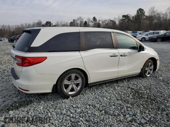 2019 Honda Odyssey EX-L with VIN 5FNRL6H72KB014960, listed as a Copart auction lot 48701035 with 131,921 mi miles and Salvage Title. Bid and sale history available at carsss.com. Image 3.