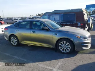 2018 Kia Optima LX with VIN 5XXGT4L32JG256921, listed as a IAAI auction lot 41389850 with 91,013 mi miles and . Bid and sale history available at DreamBid. Image 12.