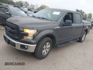 2015 Ford F-150 XL with VIN 1FTEW1CF4FFA75879, listed as a IAAI auction lot 41923278 with 198,146 mi miles and . Bid and sale history available at DreamBid. Image 2.